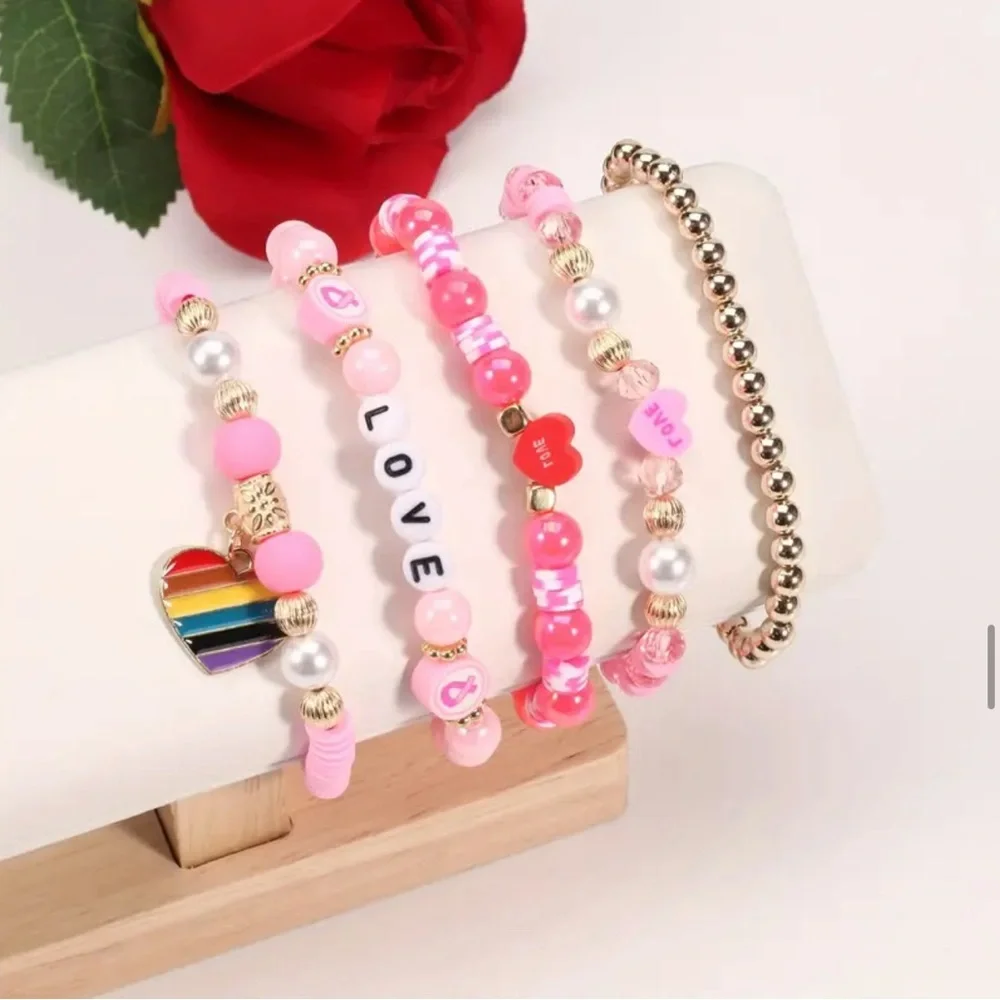 NWT! Fashion Jewelry 5 pink and gold beaded stackable stretch bracelets